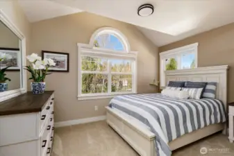 Spacious bedroom on upper level faces west