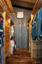 Cedar lined closet with built in shelving and brand new barn door!