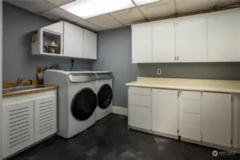 Massive laundry room with SO much storage!