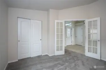 A view from the third guest suite or office/den looking out into the welcoming entryway.