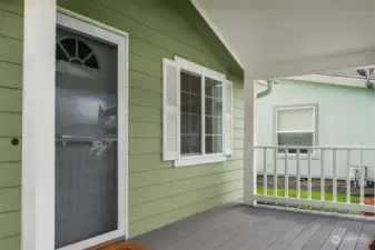 The rocking chair front porch welcomes you home.