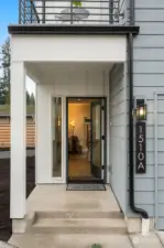 This model home’s sleek exterior makes a stunning first impression! Imagine walking through this door after a long day!