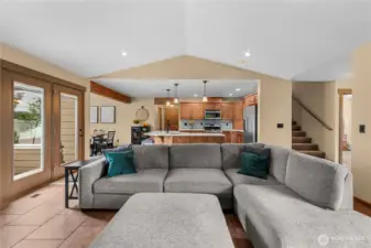 Open-concept living area with seamless flow to kitchen and backyard.