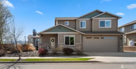Charming two-story home on cul-de-sac with private yard and sidewalks.