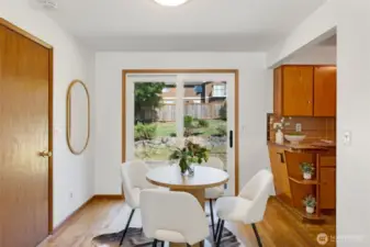 Dining space with backyard access.