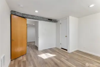 The second room on the lower level.