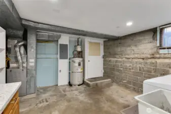 Looking back the other way in the utility room, you can see the door that leads up to the garage.