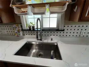 Quartz Counters and Undermount Single Bowl Stainless Steel Sink