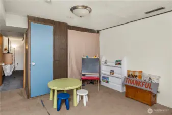 This versatile lower-level bonus space connects to the bedroom and kitchenette, creating a flexible layout ideal for extended living or multi-generational needs. Whether used as a playroom, gym, or hobby area, it provides endless options for how you live and gather.