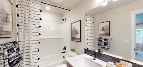 Photo is of a model home in another KB Home location; options and colors may vary based on your selections. Depictions of home, layout, location or other features/options, colors and color scheme, materials, fixtures, etc. are for showing purposes only and may not be included in the purchase price and availability may vary.