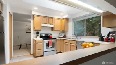 From the kitchen, you’re connected to it all - conversation, laughter, and everyday life flow easily through this space. It’s exactly how a home should feel.