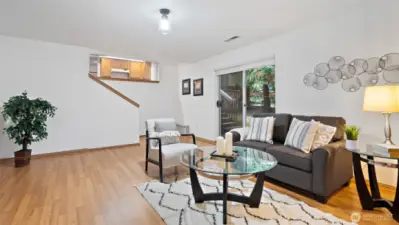 Downstairs, the living area offers plenty of room to spread out and make it your own. It’s spacious, flexible, and ready to become whatever you need - movie room, hobby space, or a cozy spot to unwind.