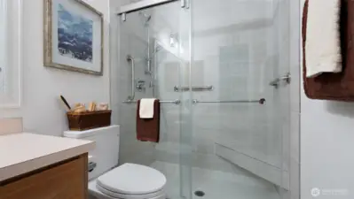 Check out the newly updated walk-in shower off the primary! It's fresh and modern, with a built-in bench that makes it both beautiful and comfortable to use every day.