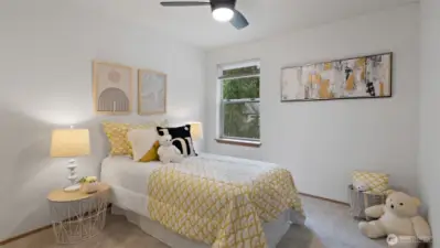 Bedroom two feels light and welcoming, with fresh carpet underfoot and a new ceiling fan overhead. It’s move-in ready and full of natural light -- an easy space to make your own.