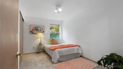 Bedroom three sits right next to bedroom two, offering flexibility for a guest room, home office, or creative space. Fresh carpet and natural light make it feel comfortable and inviting.