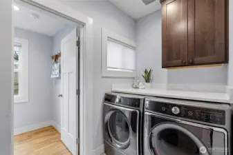 Laundry room down the hall from the bedrooms and bathroom