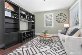 Cozy living room filled with natural light.