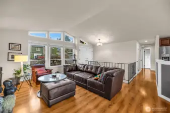 Large windows give you lots of natural light. main floor with vaulted ceilings.