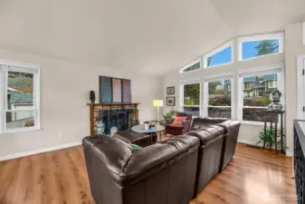 The fireplace in the living room is wood-burning, or the owner has installed an electric F/P in the space.