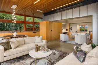 Main house living and family room with folding doors for privacy