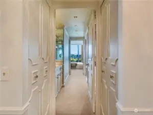 You can see the two coat closets on either side of the hall leading to the second bedroom.