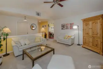 Sunny entryway and large coat closet greet you.