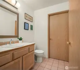 Main Floor Powder Room With Enclosed Laundry Room