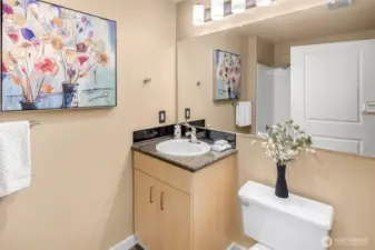 Crisp and clean with sleek accents, the bathroom offers just the right touch of style to start and end your day.