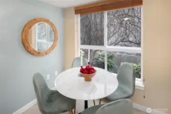The sweetest little dining nook, complete with a serene garden outlook—your go-to spot for breakfast, journaling, or game night.