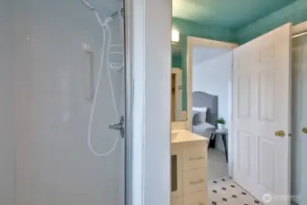 This bathroom has been remodeled with a new shower, vanity and light fixtures. There are two closets in this bathroom!