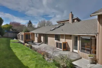 Another perspective of your fenced backyard. East Harbor Rd (25 MPH) runs along the backside of your home. Sellers installed a new fence during their ownership.