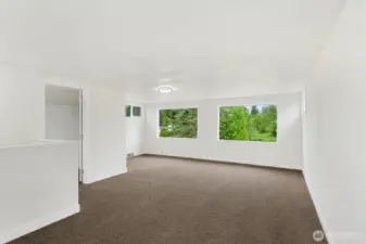Bedroom #4 upstairs with large picture windows