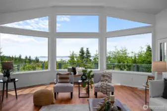 Walls of windows flood the home with light and capture unforgettable sunsets.