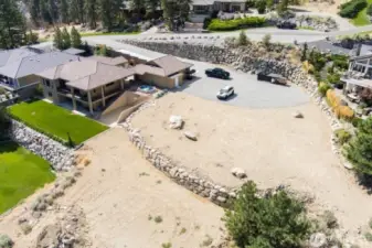 Driveway is already in and utilities are stubbed to the lot.