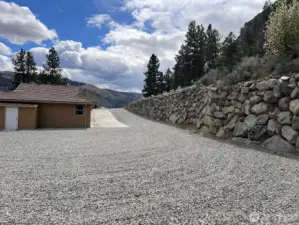 On the building lot and looking back up the shared driveway.