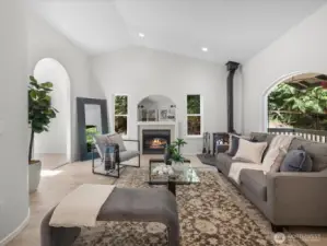 Step inside to an inviting living space flooded with natural light. Large windows bring the outdoors in, while the new flooring underfoot adds warmth and cohesion.