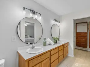 Completely refreshed with modern fixtures and finishes, the ensuite bath offers a calming, spa-like experience with a sleek vanity, updated lighting, and a clean, functional layout.