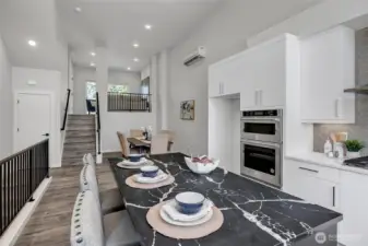 Kitchen features island with eating space (photos of lot34, same floorplan)