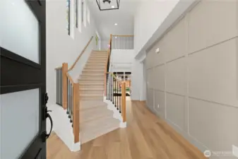 Vaulted Ceiling Foyer with Accent Wall