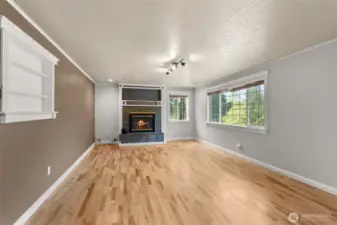 Warm, comfortable fireplace perfect for relaxing with plenty of natural light