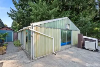 Covered pool room with heat pump heating.