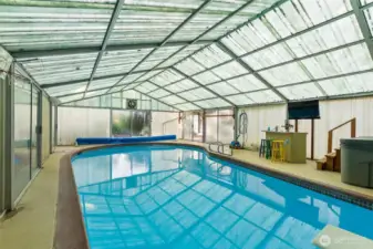 Enjoy swimming all year long in the enclosed covered pool.