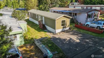 Nestled in Mill Wheel Park, this home offers a serene retreat with a cozy setting.