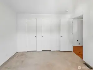 Wide walkthrough closets keep everything organized while maximizing space.