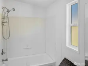 Simple and practical, the ensuite adds an extra touch of comfort.