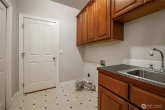Laundry room leads into the 2 car garage.