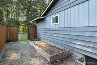 Raised garden beds and extra side fence