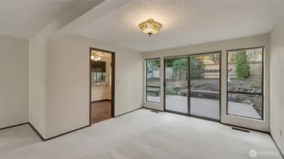 A bright, open dining area that flows effortlessly to the backyard.