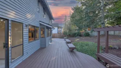 A charming deck walkway connecting indoor comfort to outdoor living.