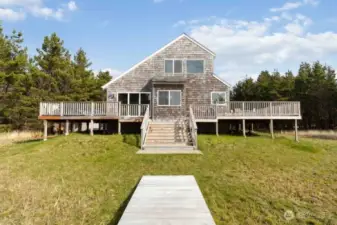 A secluded oceanfront retreat where the sounds of wind, waves, and wildlife replace the noise of the city.